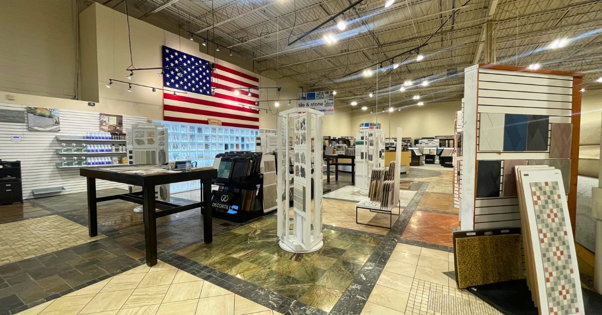 Floors USA interior featuring a large American flag prominently displayed on the wall.